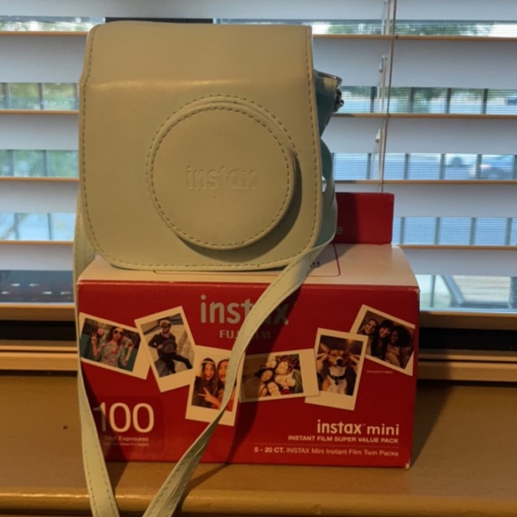 Polaroid Camera with case and 50+ films